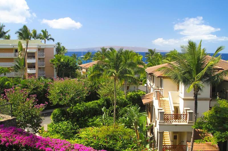 Lush tropical landscapes with ocean views and islands in the background