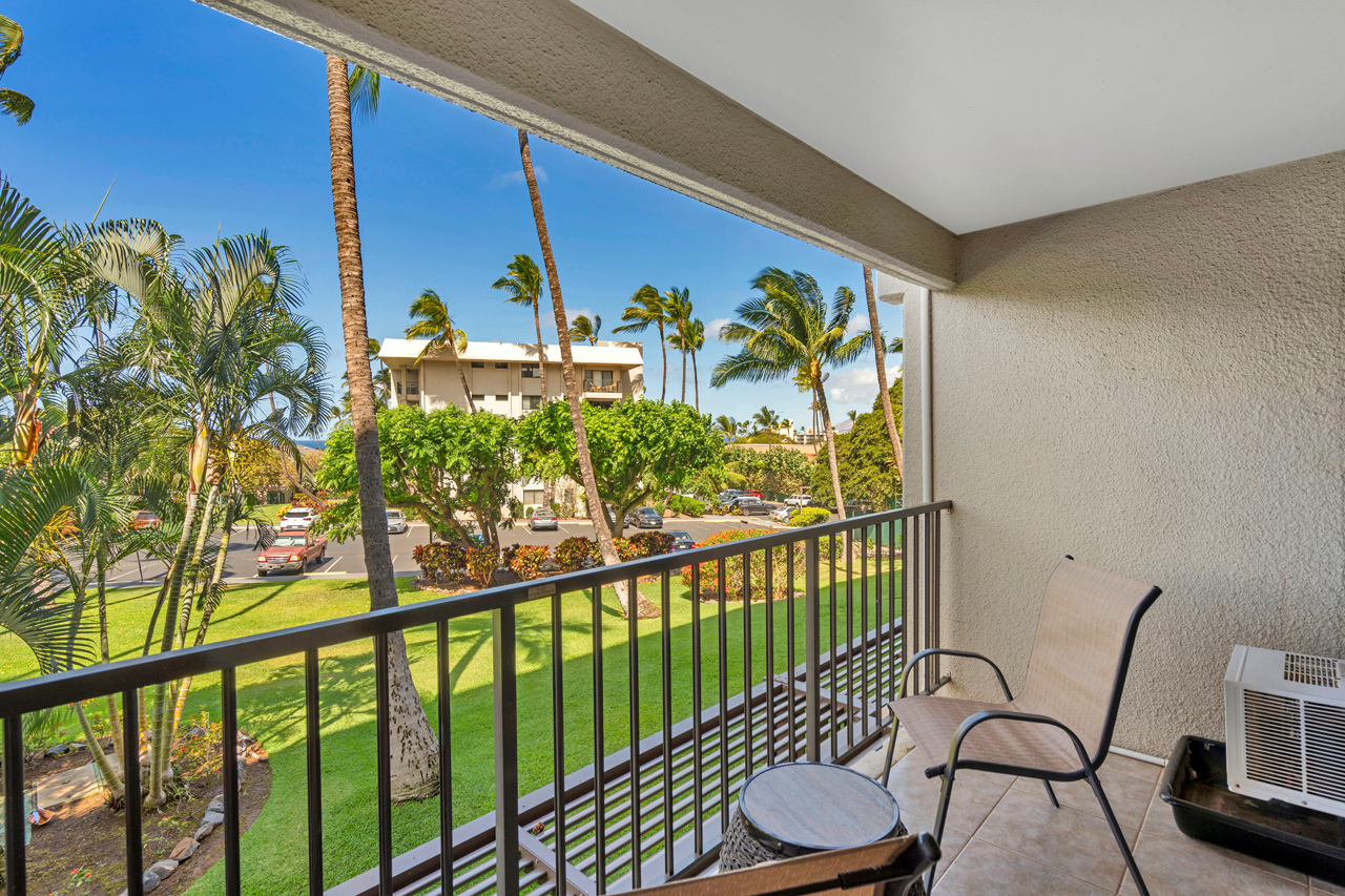 Covered Lanai with partial ocean view: 